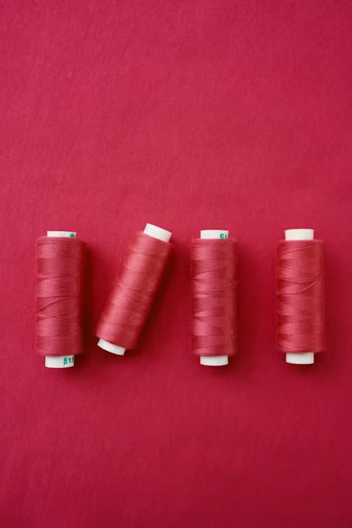 Premium golden silk threads used in scarf manufacturing India