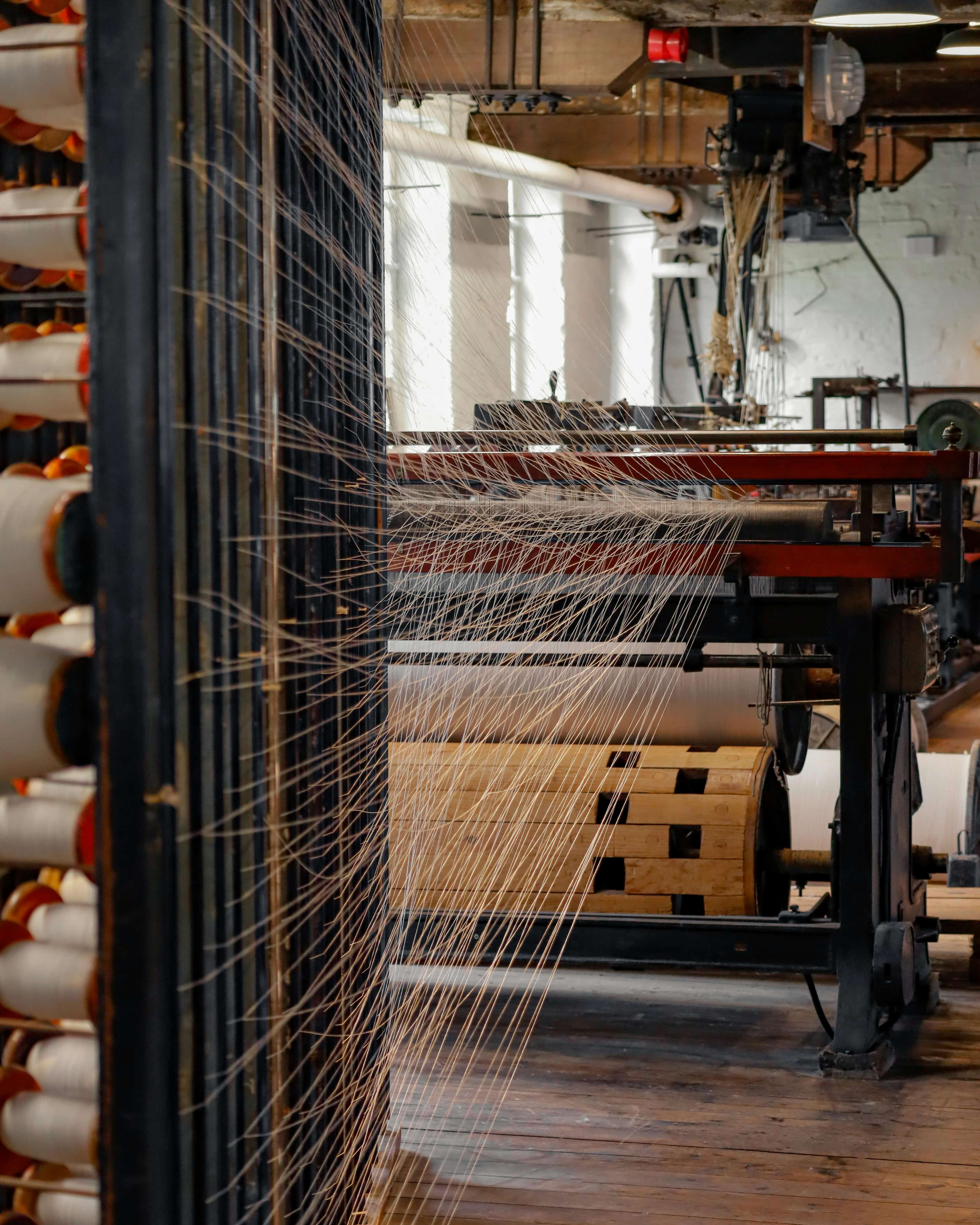 Yarn warping process at Aleem and Company textile factory India